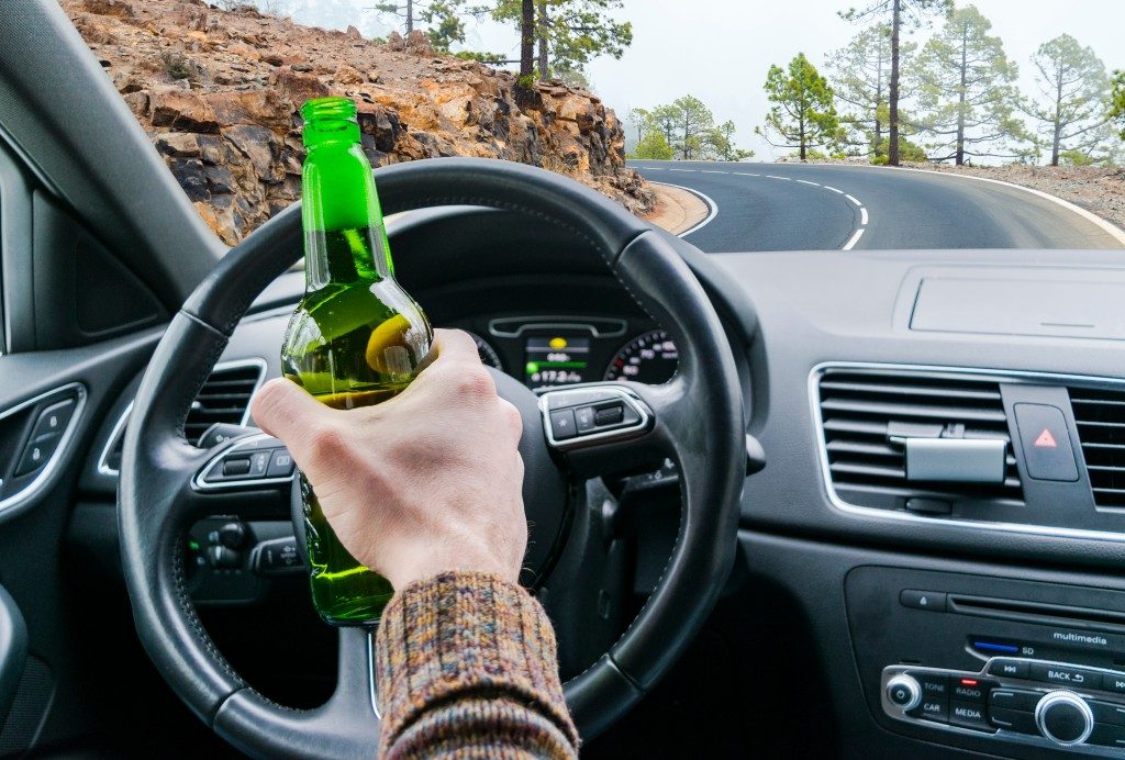 Person drinking while driving